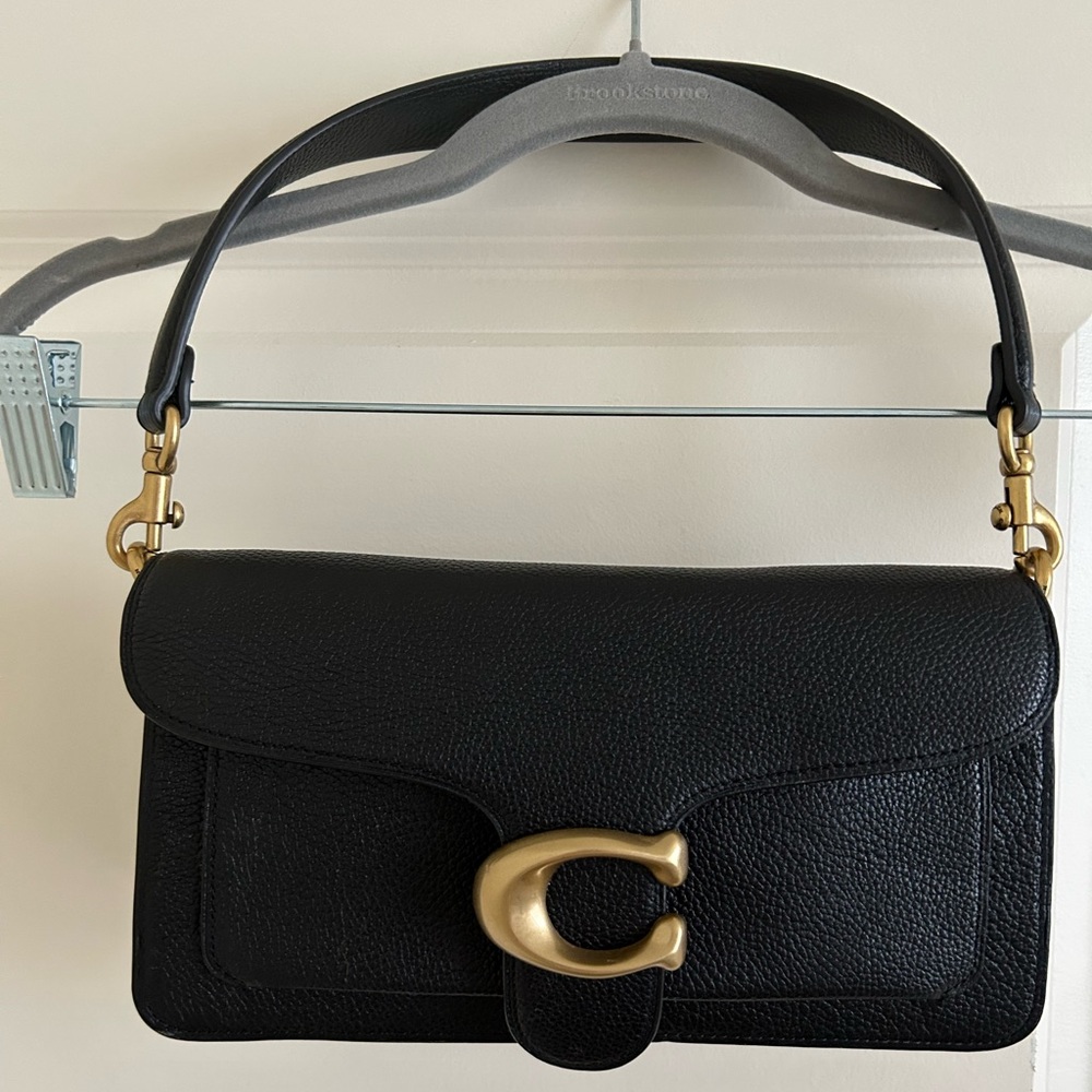 Brand new Coach Abby leather handbag. Can be crossbody or shoulder bag